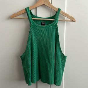 BDG brand tank size Small! Great green color and very comfy.